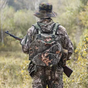 a moblie hunter is wearing Kalkal turkey vest in the field
